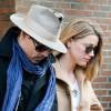 Johnny Depp et sa fiancée Amber Heard quittent leur hôtel main dans la main. New York, le 22 mars 2014