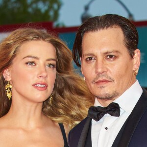 Johnny Depp et sa femme Amber Heard - Tapis rouge du film Black Mass (Strictly Criminal) lors du 72ème festival du film de Venise (la Mostra), le 4 septembre 2015.