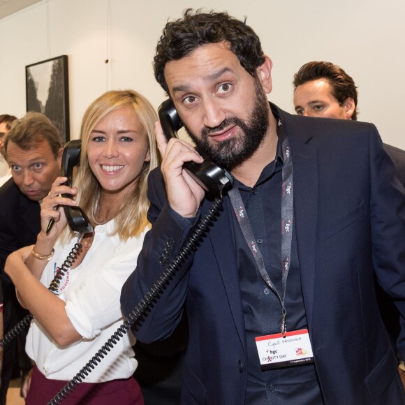 Cyril Hanouna et Enora Malagré - 11e édition du "BGC Charity Day" à Paris le 11 septembre 2015 en mémoire aux 658 collaborateurs du groupe BGC partners (leader mondial du courtage interbancaire) disparus il y a 14 ans dans les attentats du World Trade Center le 11 septembre 2001.