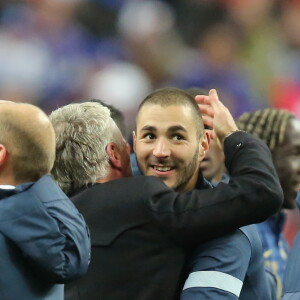 Didier Deschamps et Karim Benzema lors de France - Ukraine le 19 novembre 2013, une victoire synonyme de qualification pour la Coupe du monde 2014.