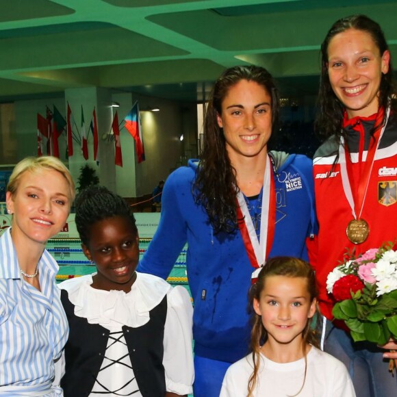 La princesse Charlene et le prince Albert II de Monaco ont assisté aux finales du XXXIVe Meeting Mare Nostrum à la piscine du Stade Louis II le 5 juin 2016. © Olivier Huitel/Pool Monaco/Bestimage