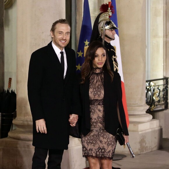 Le DJ David Guetta et sa compagne Jessica Ledon arrivent au dîner d'état donné en l'honneur du président cubain Raul Castro au palais de l'Elysée à Paris, le 1er février 2016. © Stéphane Lemouton/Bestimage