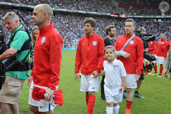 Louis Tomlinson à un Match de football caritatif au stade Old Trafford à Manchester, le 5 juin 2016.