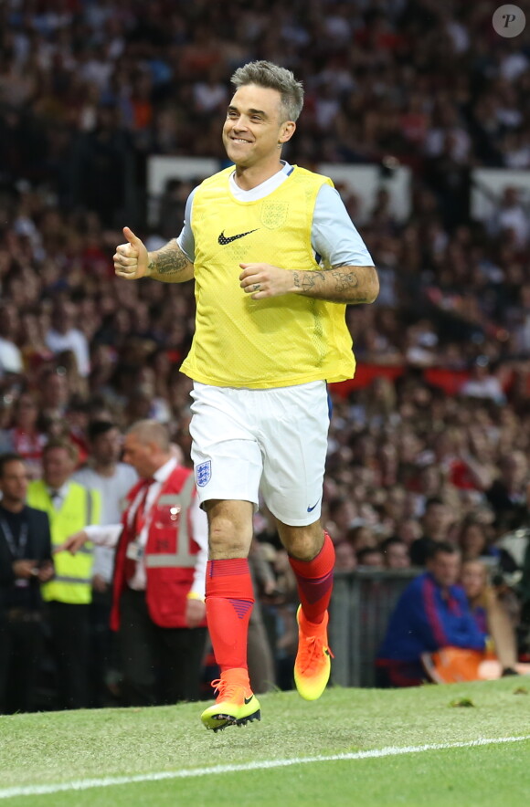 Robbie Williams à un Match de football caritatif au stade Old Trafford à Manchester, le 5 juin 2016.