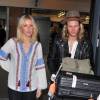 Ellie Goulding et son compagnon Dougie Poynter arrivent à l'aéroport Heathrow de Londres, pour prendre un avion pour Los Angeles. Le 1er juin 2015