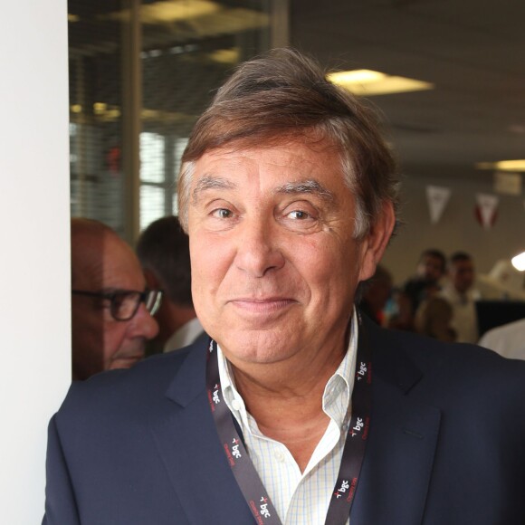 Charity Day BGC 2014 - Jean-Pierre Foucault - Courtier d'un jour pour encourager les clients à passer ce jour là le maximum d'ordres dans la salle des marchés d'Aurel BGC Rue Vivienne à Paris. Le 11 septembre 2014.