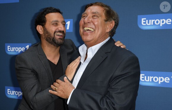 Cyril Hanouna et Jean-Pierre Foucault - Conférence de rentrée de Europe 1 à Paris. Le 3 septembre 2014