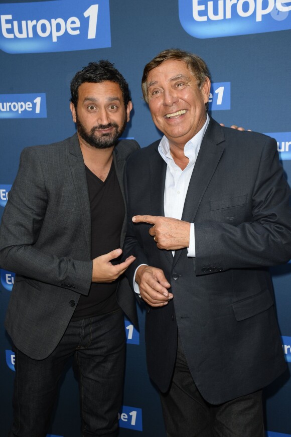 Cyril Hanouna et Jean-Pierre Foucault - Conférence de rentrée de Europe 1 à Paris. Le 3 septembre 2014