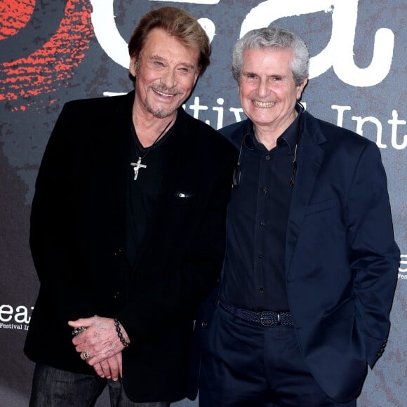 Johnny Hallyday et Claude Lelouch - Soirée d'ouverture du 6e Festival International du Film Policier de Beaune avec un hommage à Johnny Hallyday pour l'ensemble de sa carrière cinématographique, le 2 avril 2014.