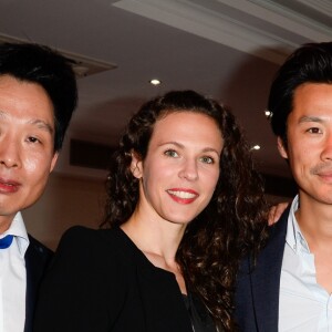 Exclusif - Taki Zhang, Lorie Pester, Frédéric Chau et Laury Thilleman lors du "Gala Exquis", un dîner de gala exceptionnel, au profit de l'UNICEF France, au restaurant Exquis à Paris, France le 4 juillet 2016, organisé par l'Association Internationale de la Gastronomie Chinoise, qui représente plus de 10 000 restaurants asiatiques en France. © Coadic Guirec/Bestimage