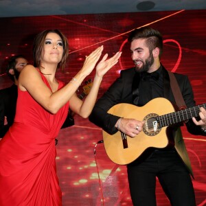 Exclusif - Eva Longoria (robe Monsoori, bijoux Messika) danse avec Kendji Girac - Dîner du Global Gift Gala au profit de L'Unicef France Frimousses de Créateurs, de The Global Gift Foundation et The Eva Longoria Foundation, organisé au Four Seasons Hôtel George V à Paris, le 25 mai 2015.