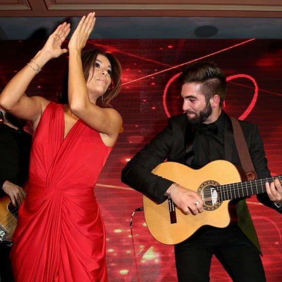 Exclusif - Eva Longoria (robe Monsoori, bijoux Messika) danse avec Kendji Girac - Dîner du Global Gift Gala au profit de L'Unicef France Frimousses de Créateurs, de The Global Gift Foundation et The Eva Longoria Foundation, organisé au Four Seasons Hôtel George V à Paris, le 25 mai 2015.