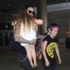 David Beckham et ses enfants Harper et Cruz à l'aéroport de LAX à Los Angeles, le 11 juillet 2016.