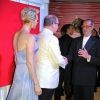 Le prince Albert II de Monaco et sa femme la princesse Charlène de Monaco saluent l'artiste Turi Simeti - 68ème gala de la Croix-Rouge monégasque dans la salle des Etoiles du Sporting Monte-Carlo à Monaco, le 23 juillet 2016. © Bruno Bebert/Bestimage