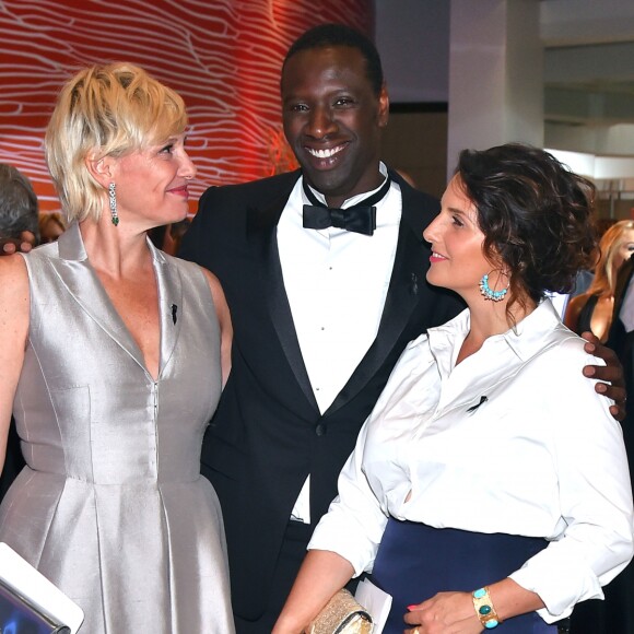 Maïtena Biraben, Omar Sy et sa femme Hélène - 68ème gala de la Croix-Rouge monégasque dans la salle des Etoiles du Sporting Monte-Carlo à Monaco, le 23 juillet 2016. © Bruno Bebert/Bestimage