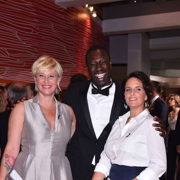 Maïtena Biraben, Omar Sy et sa femme Hélène - 68ème gala de la Croix-Rouge monégasque dans la salle des Etoiles du Sporting Monte-Carlo à Monaco, le 23 juillet 2016. © Bruno Bebert/Bestimage