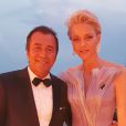 Charlene de Monaco et Bernard Montiel au 68ème gala de la Croix-Rouge Monégasque dans la salle des Etoiles du Sporting Monte-Carlo à Monaco, le 23 juillet 2016.