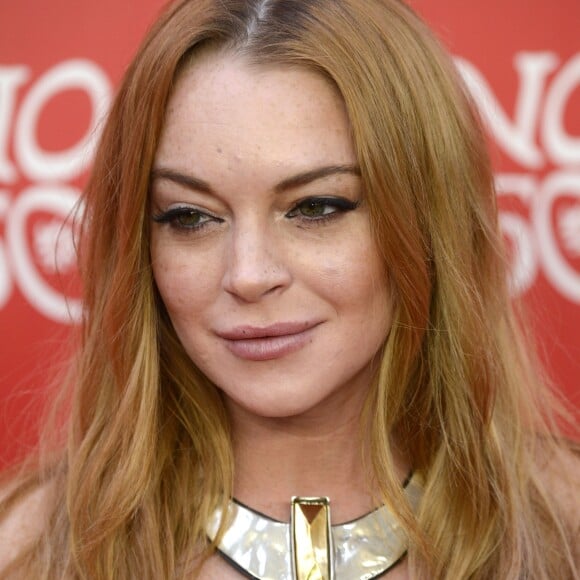 Lindsay Lohan assiste à la soirée anniversaire de la marque de bijoux "UNOde50" à Madrid. Le 9 juin 2016