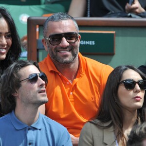 Amel Bent et son ami Patrick Antonelli, Sofia Essaïdi aux Internationaux de France de tennis de Roland Garros à Paris, le 5 juin 2014.