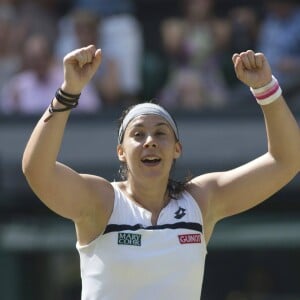 Marion Bartoli - Marion Bartoli a remporte son tout premier succes en grand chelem en disposant de l'Allemande Sabine Lisicki 6-1, 6-4 en finale de Wimbledon a Londres Le 6 juillet 2013.