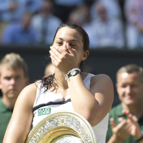 Marion Bartoli - Marion Bartoli a remporte son tout premier succes en grand chelem en disposant de l'Allemande Sabine Lisicki 6-1, 6-4 en finale de Wimbledon a Londres Le 6 juillet 2013.