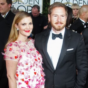 Drew Barrymore enceinte et son mari Will Kopelman - 71eme ceremonie des Golden Globe Awards a Beverly Hills, le 12 janvier 2014.