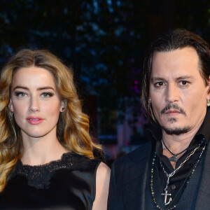 Johnny Depp et sa femme Amber Heard à l'Avant-première du film "Black Mass" lors du Festival BFI à Londres, le 11 octobre 2015