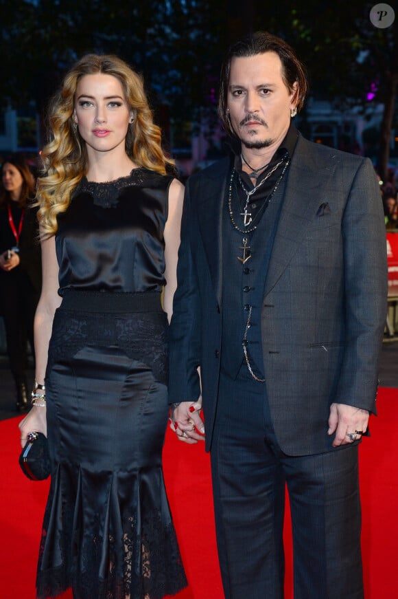 Johnny Depp et sa femme Amber Heard à l'Avant-première du film "Black Mass" lors du Festival BFI à Londres, le 11 octobre 2015