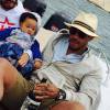 JoeyStarr en vacances avec son fils Marcello (7 mois) à la dune du Pyla - juillet 2015