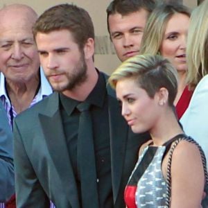 Miley Cyrus et Liam Hemsworth à la première du film "Paranoia" à Los Angeles, le 8 août 2013.