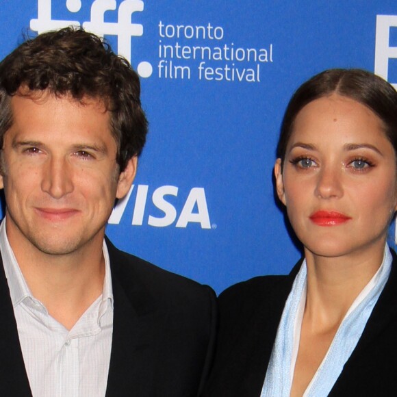Marion Cotillard (habillee en Dior Haute Couture) et Guillaume Canet - Conference de Presse du film "Bood Ties" lors du Festival International du Film de Toronto, le 10 septembre 2013.  10th September, 2013: Marion Cotillard, Guillaume Canet at 'Blood Ties' Press Conference during the 2013 Toronto International Film Festival at TIFF Bell Lightbox.10/09/2013 - Toronto