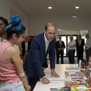 Le prince William, duc de Cambridge, en visite à la Caius House, un centre pour les jeunes à Londres dans le quartier de Battersea le 14 septembre 2016.