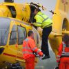 Le prince William, duc de Cambridge, lors de son premier jour en tant que pilote d'hélicoptère-ambulance au sein de l'organisme East Anglian Air Ambulance (EAAA) à l'aéroport de Cambridge, le 13 juillet 2015.