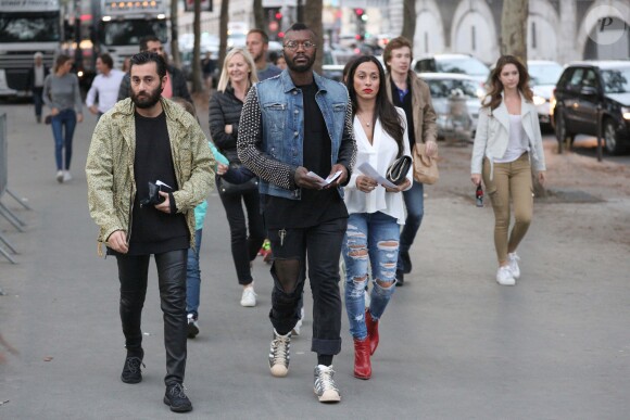 Exclusif - Djibril Cissé et sa compagne Marie-Cécile Lenzini arrivent au concert de Justin Bieber à l'AccorHotels Arena à Paris dans le cadre de sa tournée "Purpose World Tour", le 20 septembre 2016.