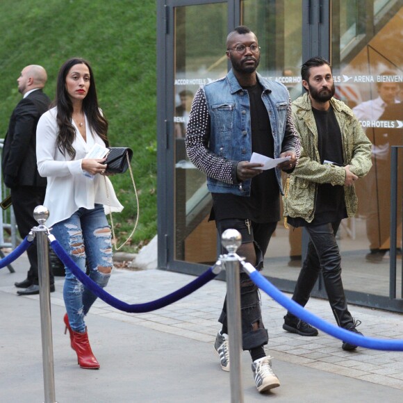 Exclusif - Djibril Cissé et sa compagne Marie-Cécile Lenzini arrivent au concert de Justin Bieber à l'AccorHotels Arena à Paris dans le cadre de sa tournée "Purpose World Tour", le 20 septembre 2016.