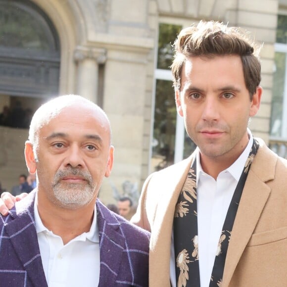 Christian Louboutin et le chanteur Mika arrivant au défilé de mode "Valentino", collection prêt-à-porter Printemps-Eté 2017 à Paris, le 2 octobre 2016