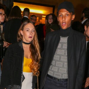 Le chanteur Stromae et sa femme Coralie Barbier - Défilé de mode "Kenzo" collection prêt-à-porter Printemps-Eté 2017 lors de la Fashion Week de Paris à la Cité de l'architecture et du patrimoine au Trocadéro à Paris, France, le 4 octobre 2016. © Agence/Bestimage