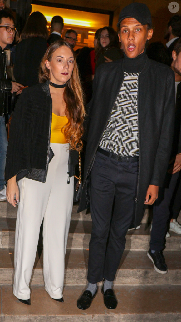 Le chanteur Stromae et sa femme Coralie Barbier - Défilé de mode "Kenzo" collection prêt-à-porter Printemps-Eté 2017 lors de la Fashion Week de Paris à la Cité de l'architecture et du patrimoine au Trocadéro à Paris, France, le 4 octobre 2016. © Agence/Bestimage