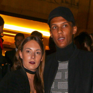 Le chanteur Stromae et sa femme Coralie Barbier - Défilé de mode "Kenzo" collection prêt-à-porter Printemps-Eté 2017 lors de la Fashion Week de Paris à la Cité de l'architecture et du patrimoine au Trocadéro à Paris, France, le 4 octobre 2016. © Agence/Bestimage