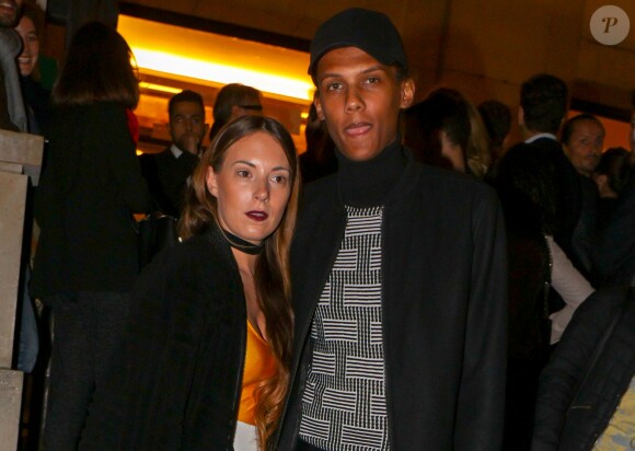 Le chanteur Stromae et sa femme Coralie Barbier - Défilé de mode "Kenzo" collection prêt-à-porter Printemps-Eté 2017 lors de la Fashion Week de Paris à la Cité de l'architecture et du patrimoine au Trocadéro à Paris, France, le 4 octobre 2016. © Agence/Bestimage