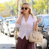 Reese Witherspoon paye son parcmètre et va déjeuner à Beverly Hills le 2 septembre 2016.