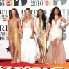 Jade Thirlwall, Perrie Edwards, Leigh-Anne Pinnock et Jesy Nelson du groupe Little Mix à la Cérémonie des BRIT Awards 2016 à l'O2 Arena à Londres, le 24 février 2016.