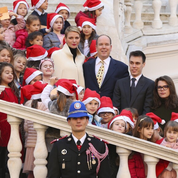 Le prince Albert II de Monaco, la princesse Charlene, Louis Ducruet et Camille Gottlieb lors de la fête de Noël et de la distribution de cadeaux aux enfants monégasques au Palais Princier, le 16 décembre 2015. © Claudia Albuquerque/Bestimage