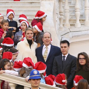 Le prince Albert II de Monaco, la princesse Charlene, Louis Ducruet et Camille Gottlieb lors de la fête de Noël et de la distribution de cadeaux aux enfants monégasques au Palais Princier, le 16 décembre 2015. © Claudia Albuquerque/Bestimage