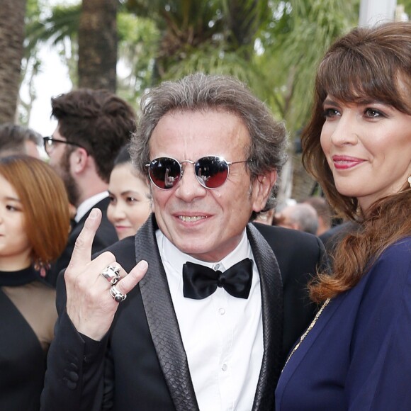 Philippe Manoeuvre et sa femme Candice de la Richardière (bijoux Van Cleef & Arpels) - Montée des marches du film "Mad Max : Fury Road" lors du 68 ème Festival International du Film de Cannes, à Cannes le 14 mai 2015.