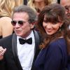 Philippe Manoeuvre et sa femme Candice de la Richardière (bijoux Van Cleef & Arpels) - Montée des marches du film "Mad Max : Fury Road" lors du 68 ème Festival International du Film de Cannes, à Cannes le 14 mai 2015.