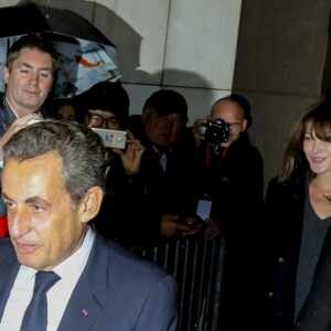 Nicolas Sarkozy, arrivé en troisième position au premier tour de la primaire de la droite et du centre, quitte son QG de campagne après avoir prononcé son discours de concession, avec sa femme Carla Bruni-Sarkozy à Paris, France, le 20 novembre 2016. © Agence/Bestimage