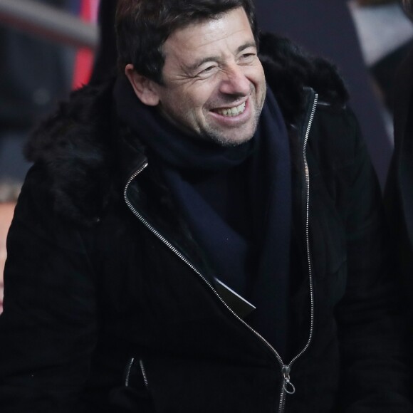 Patrick Bruel et Ary Abittan lors du match Paris Saint-Germain contre OGC Nice au Parc des Princes à Paris, France, le 11 décembre 2016.