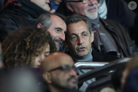 Jean-Claude Blanc (Directeur général délégué du PSG) et Nicolas Sarkozy, première sortie officielle après sa défaite à la primaire de la droite et du centre, lors du match Paris Saint-Germain contre OGC Nice au Parc des Princes à Paris, France, le 11 décembre 2016.
