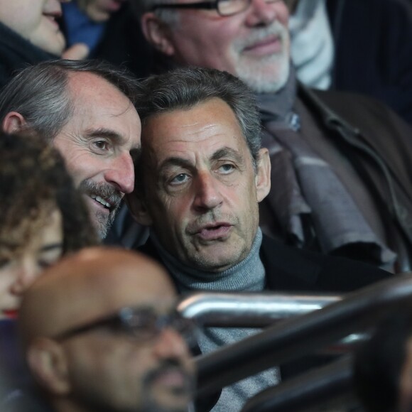 Jean-Claude Blanc (Directeur général délégué du PSG) et Nicolas Sarkozy, première sortie officielle après sa défaite à la primaire de la droite et du centre, lors du match Paris Saint-Germain contre OGC Nice au Parc des Princes à Paris, France, le 11 décembre 2016.